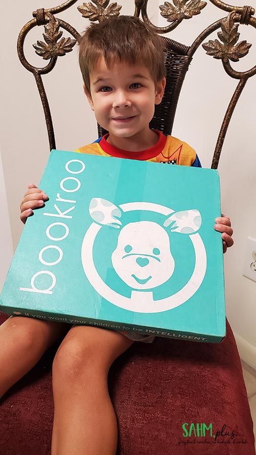 4 year old with Bookroo Box ready to Keep Calm and Read On!