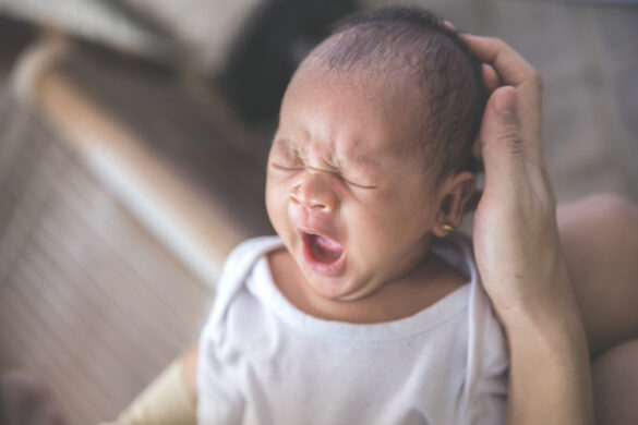 yawning baby ready to sleep - baby sleep cues and patterns