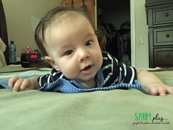 baby tummy time on bed; benefits of breastfeeding for baby | sahmplus.com