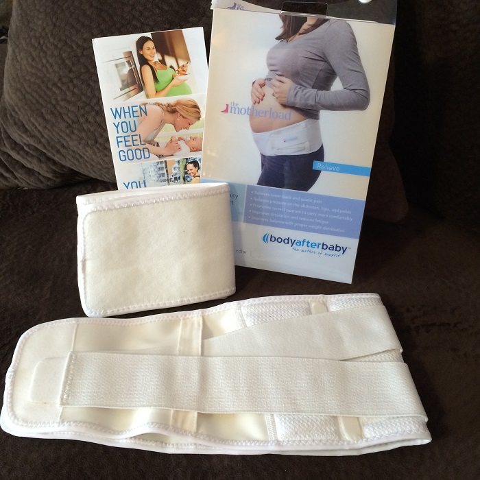 The Motherload belly support band out of package. Belly support bands for active moms. www.sahmplus.com