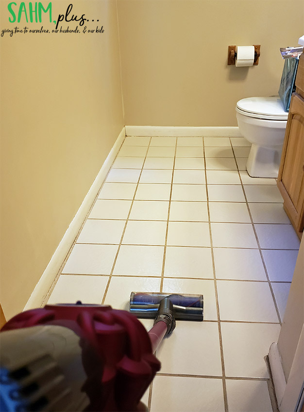 cleaning bathroom tile with dyson stick vac | sahmplus.com