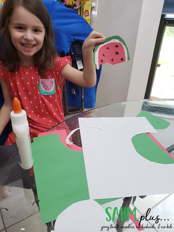 Making watermelon slice out of construction paper. Indoor crafts and art for 3 year olds