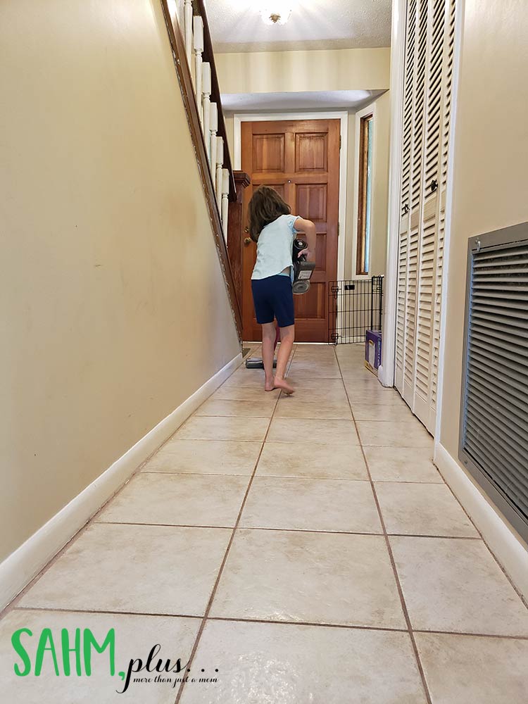 6 year old chores - daughter vacuum hallway, learning responsibility and earning money | sahmplus.com