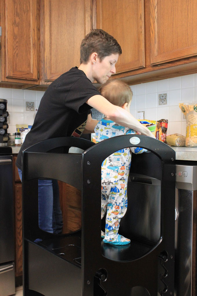 Little partners in the kitchen. Here I am with my Little Partner making trail mix cereal bars; little partners the original learning tower #affiliate #ad #kidsinthekitchen #toddlersinthekitchen| www.sahmplus.com 