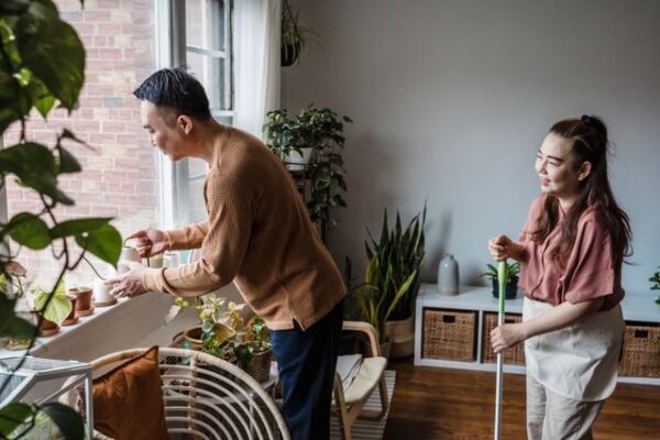 Why Your Wife Prioritizes Everything Over You + 6 Ways to Regain Her Attention 4 husband and wife tackling chores together