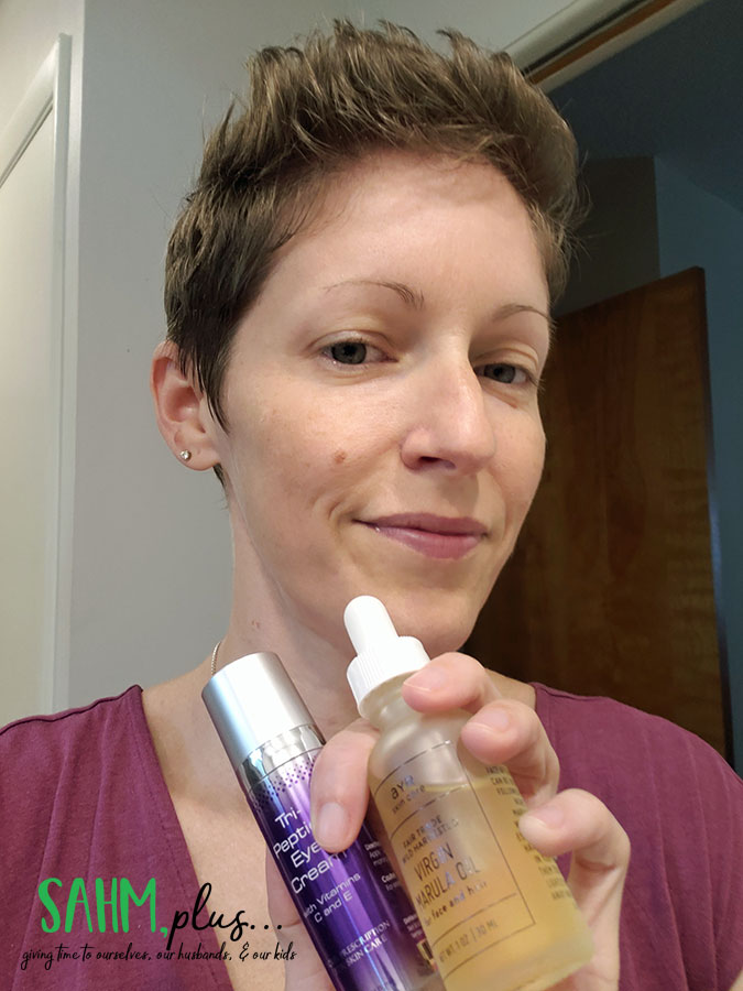 Holding two skincare products I'm using twice daily. September, I started a skincare routine for my face. Just one of the things I did to practice self love in September | sahmplus.com