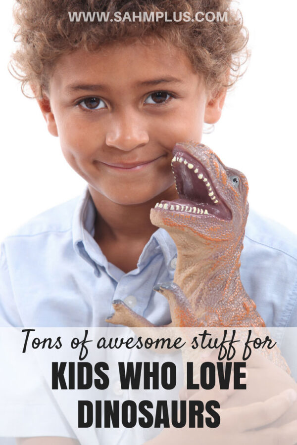 Child hugs dinosaur - pin for Child loves dinosaurs - tons of awesome stuff for kids who love dinosaurs | www.sahmplus.com
