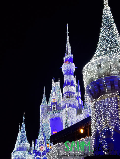 Cinderella Castle and Magic Kingdom lit for Mickey's Very Merry Christmas