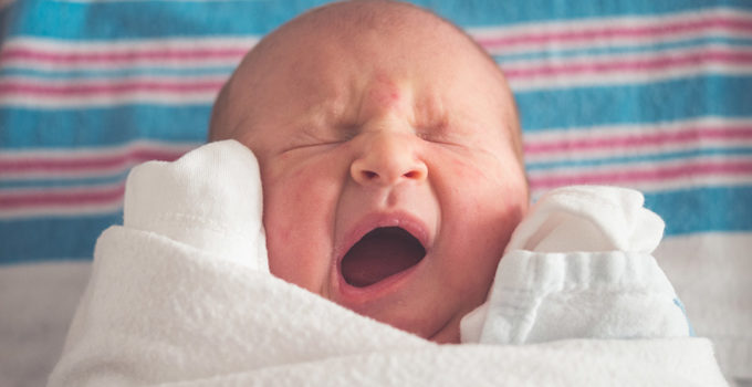 newborn baby yawning
