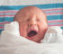newborn baby yawning