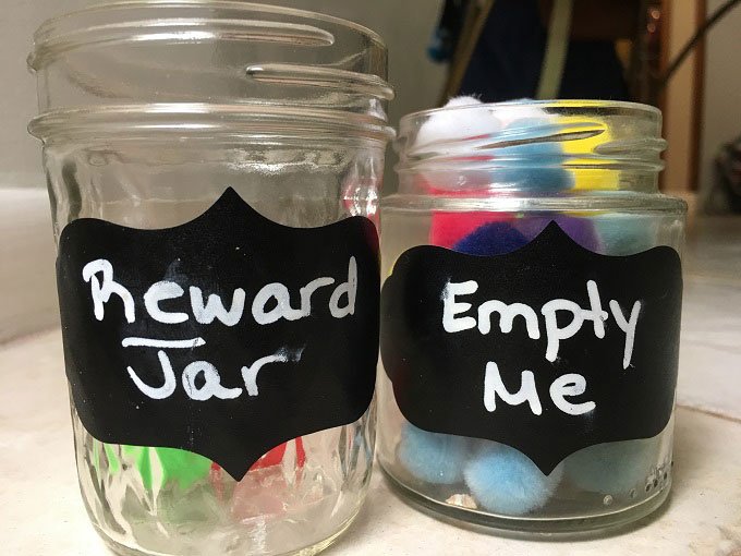 Why you should be using a reward jar when instilling a consequence jar to manage a child's behavior. | www.sahmplus.com