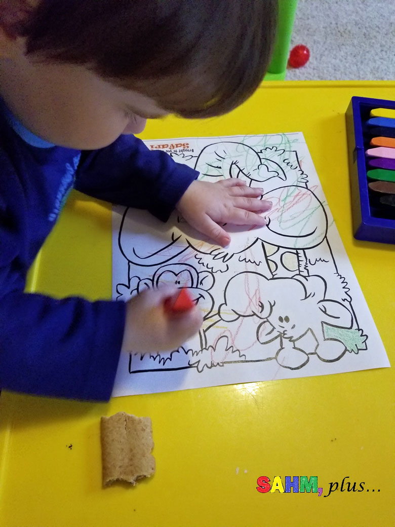 Toddler coloring a jungle page - a sponsored post on behalf of WildBrain | www.sahmplus.com