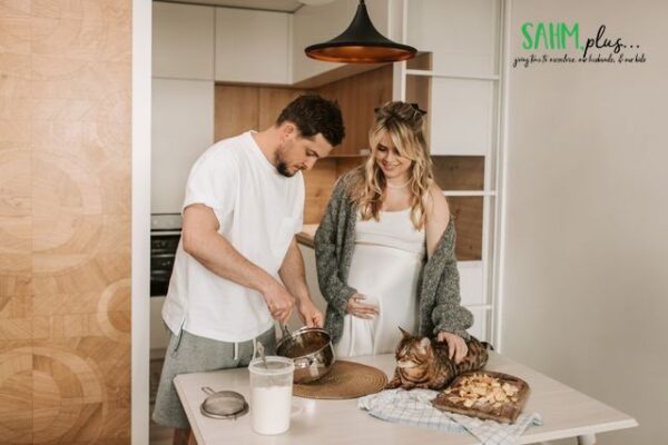 Why Your Wife Prioritizes Everything Over You + 6 Ways to Regain Her Attention 3 husband cooking for pregnant wife